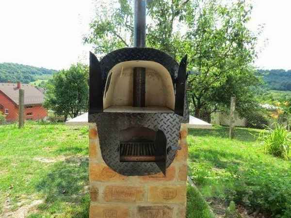 Самодельная печь из чугунной ванны своими руками