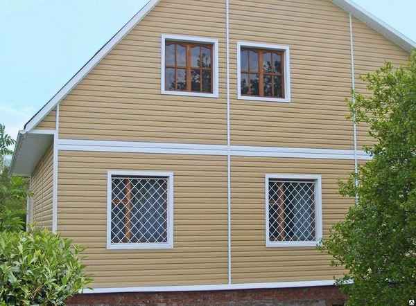 Виды сайдинга для наружной отделки дома: белый, винилон, дачный, бетонный, бесшовный, перфорированый + фото