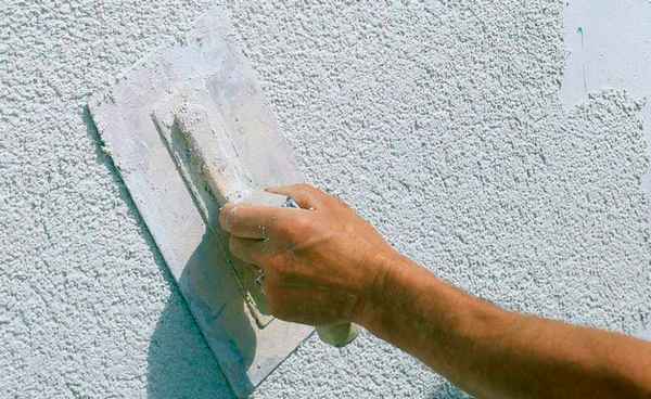 Морозостойкая фасадная штукатурка: виды и технология нанесения зимней штукатурной отделки на поверхность фасада